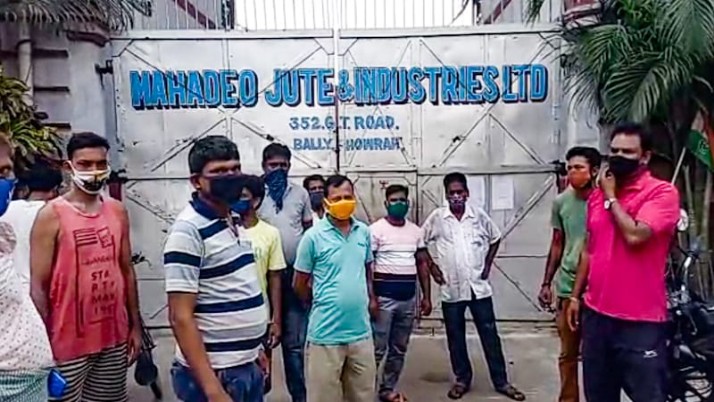 About a thousand workers sat on the road closing the jute mill in the lockdown