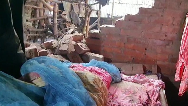 Five people, including a pregnant woman, were injured when the wall of the house collapsed