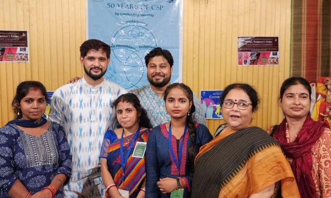 Actor Neel & director Soumyajit stand with underprivileged people