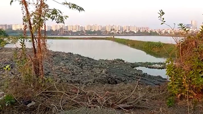 Panchayat member accused of filling water tank with canal renovation soil in Newtown, stirs uproar