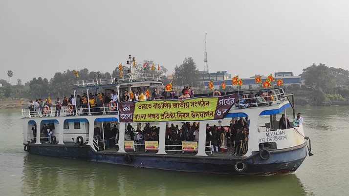 On the foundation day, a fancy procession of Bangla Pokkho along the river Bhagirathi