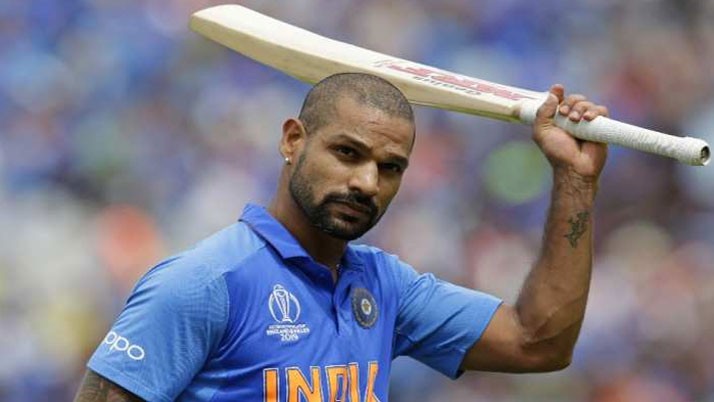 Shikhar Dhawan Standing in front of the record
